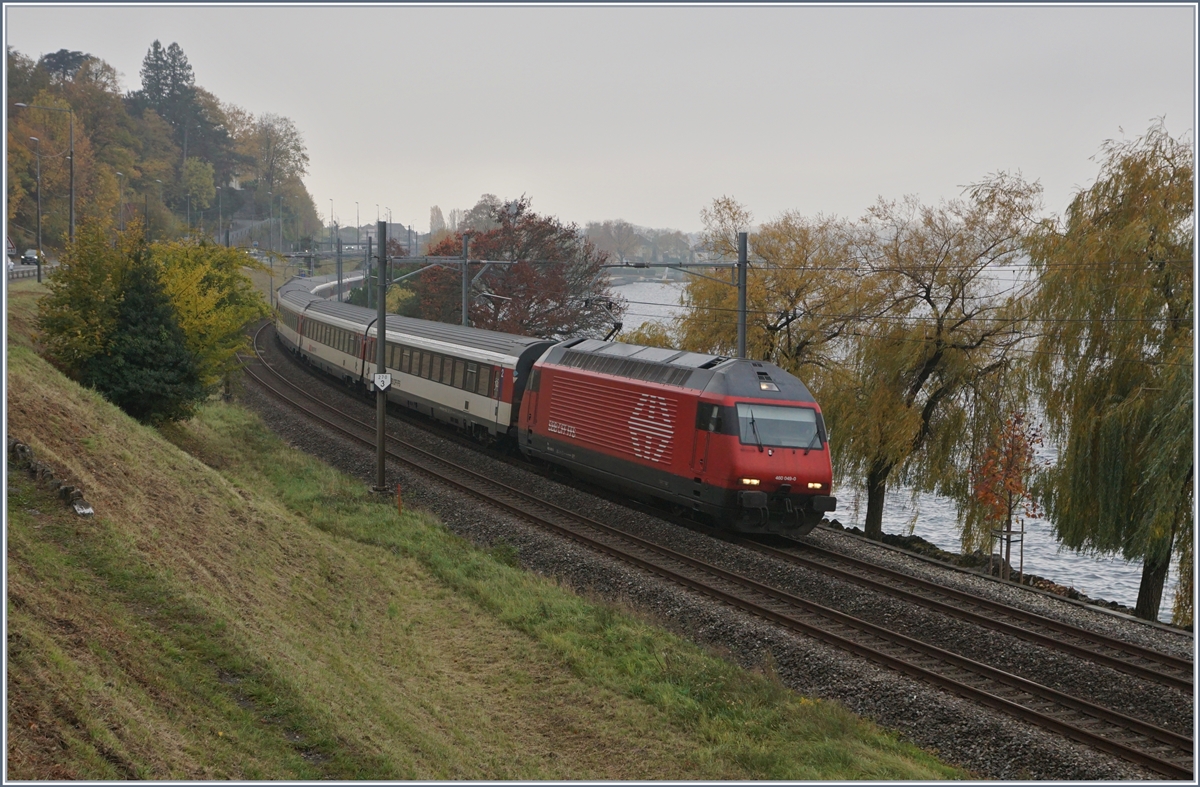 The SBB Re 460 049-0 with an IR to Geneva Airport by Villeneuve.
06.11.2018