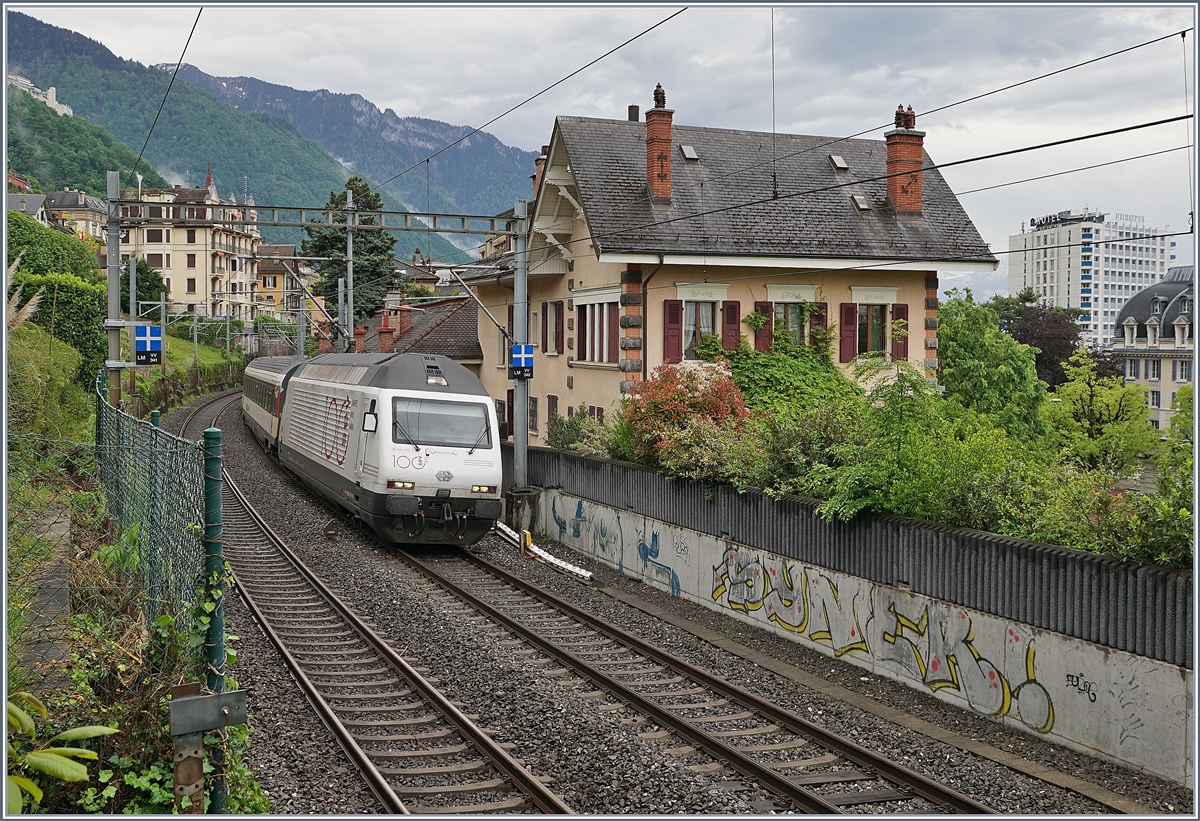 The SBB Re 460 113-4  100 years SEV  with an IR 90 by Montreux. 

05.05.2020
