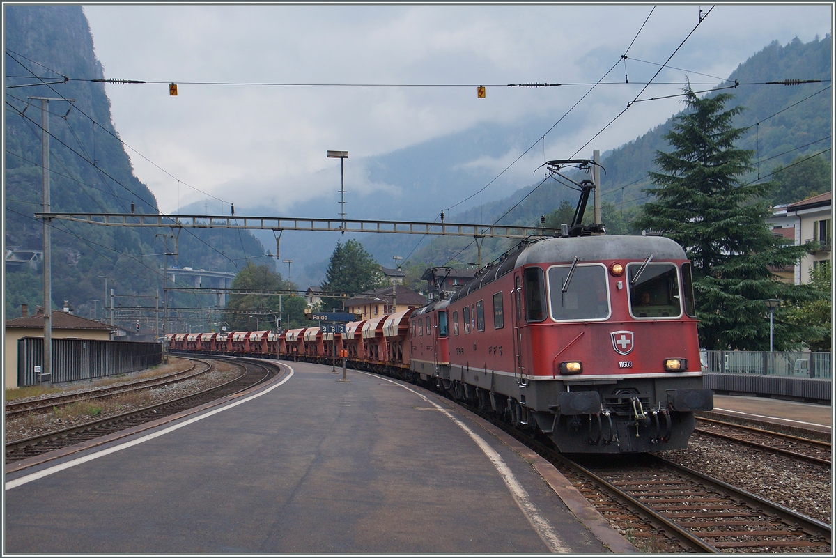 The SBB Re 6/6 11603 and a Re 4/4 II with a Cargo train in Faido.
22.09.2015