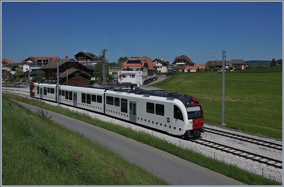 The TPF Be 2/4 -B - ABe 2/4 101 on the way to Bulle in Vaulruz Sud. 

19.05.2020