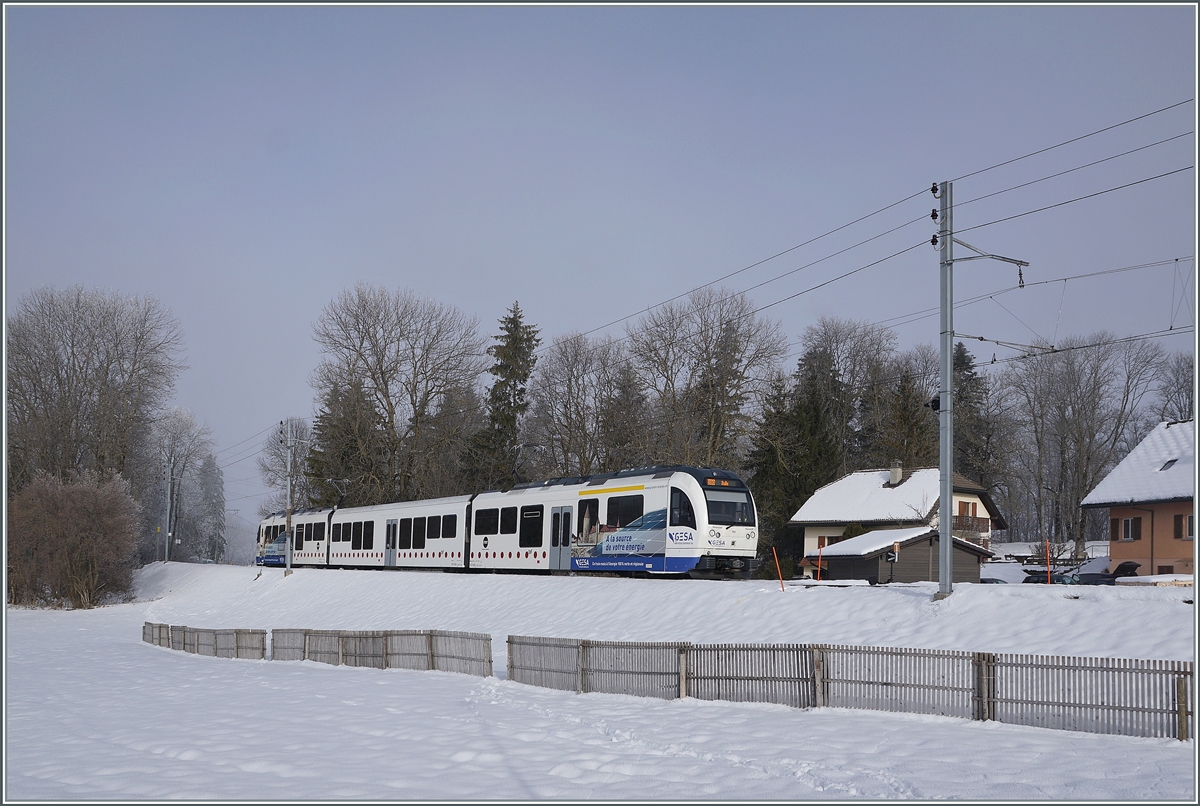The TPF Be 2/4 -B - ABe 2/4 N° 106 near Semsalens on the way to Bulle

22.12.2021