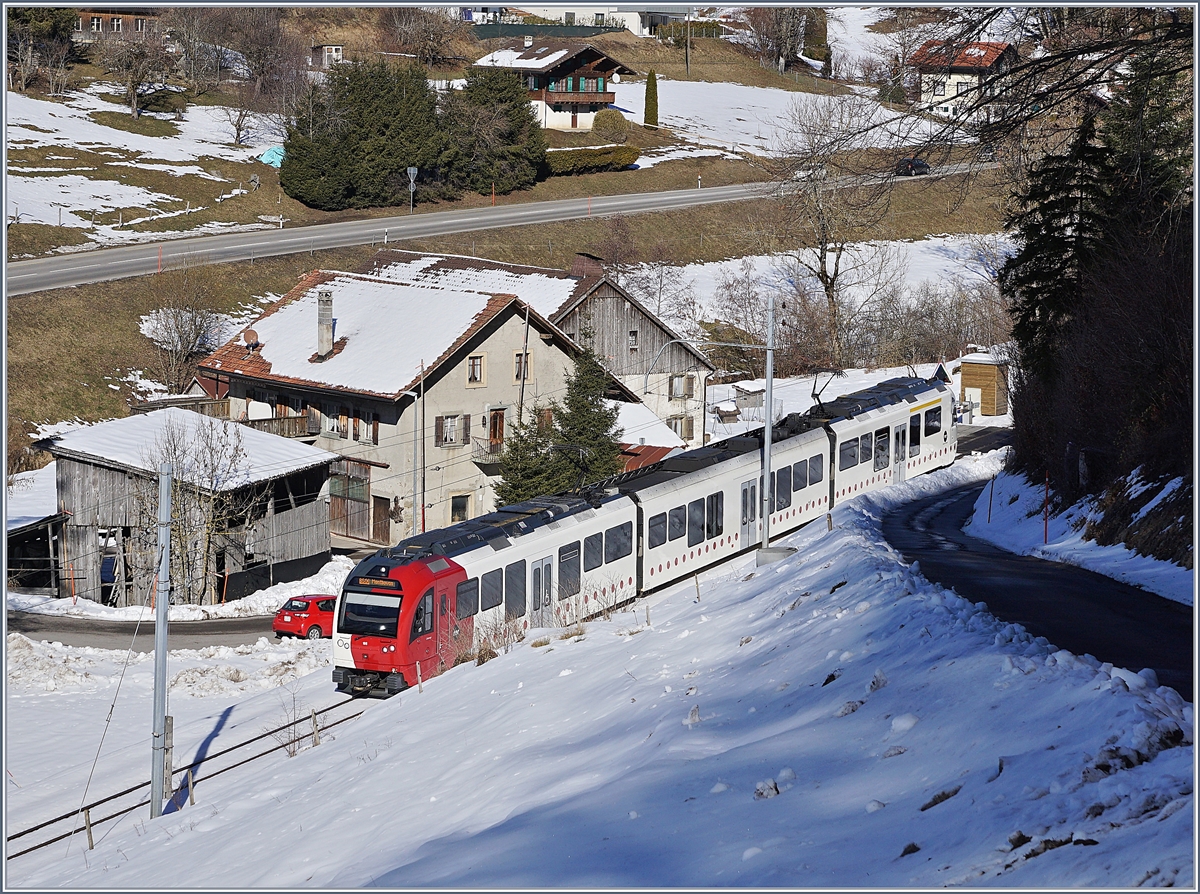 The TPF local train S 50 14826 ont the way to Montbovon with the ABe 2/5 105, B and Be 2/4 105 between Remaufes and Châtel St-Denis.

16.02.2019