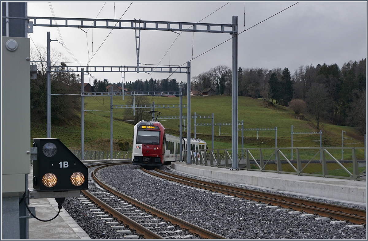 The TPF SURF ABe 2/4 - B - Be 2/4 102 on the way to Palézieux is leaving the new Châtel St-Denis Station. 

28.12.2019