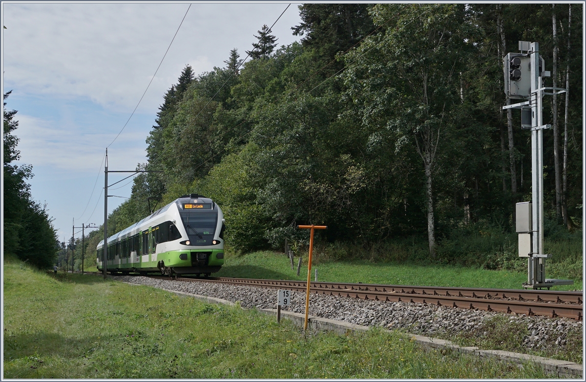 The TransN RABe 523 075 on the way to Le Locle by Geneveys sur Coffrane. 

03.09.2020