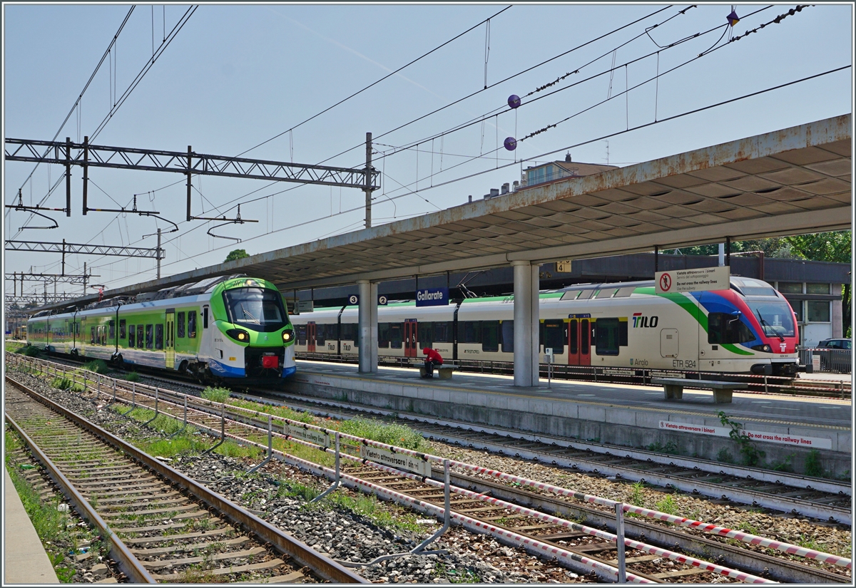 The Trenord ETR 104 017  Pop  to Luino and a SBB Tilo ETR 524 to Biasca in Gallarate. 

23.05.2023