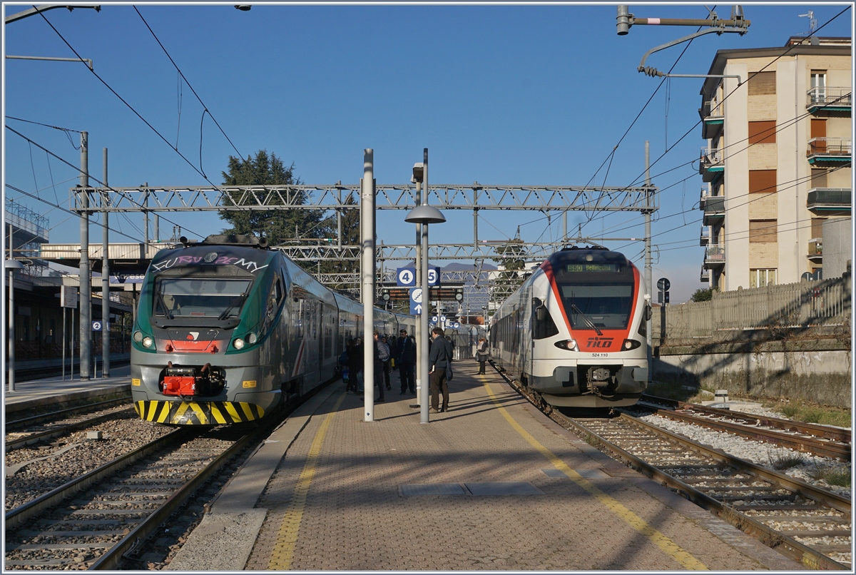 The Trenord ETR 425 033 to Milano Garibaldi and the SBB Tilo Flirt RABe 524 110 to Bellinzona in Varese. 05.01.2019
