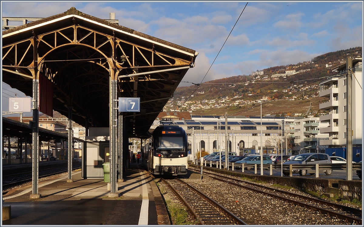 The Vevey station with CEV MVR ABeh 2/6 and in the Background the old  Atelier de Construction de Vevey . 

30.11.2019
