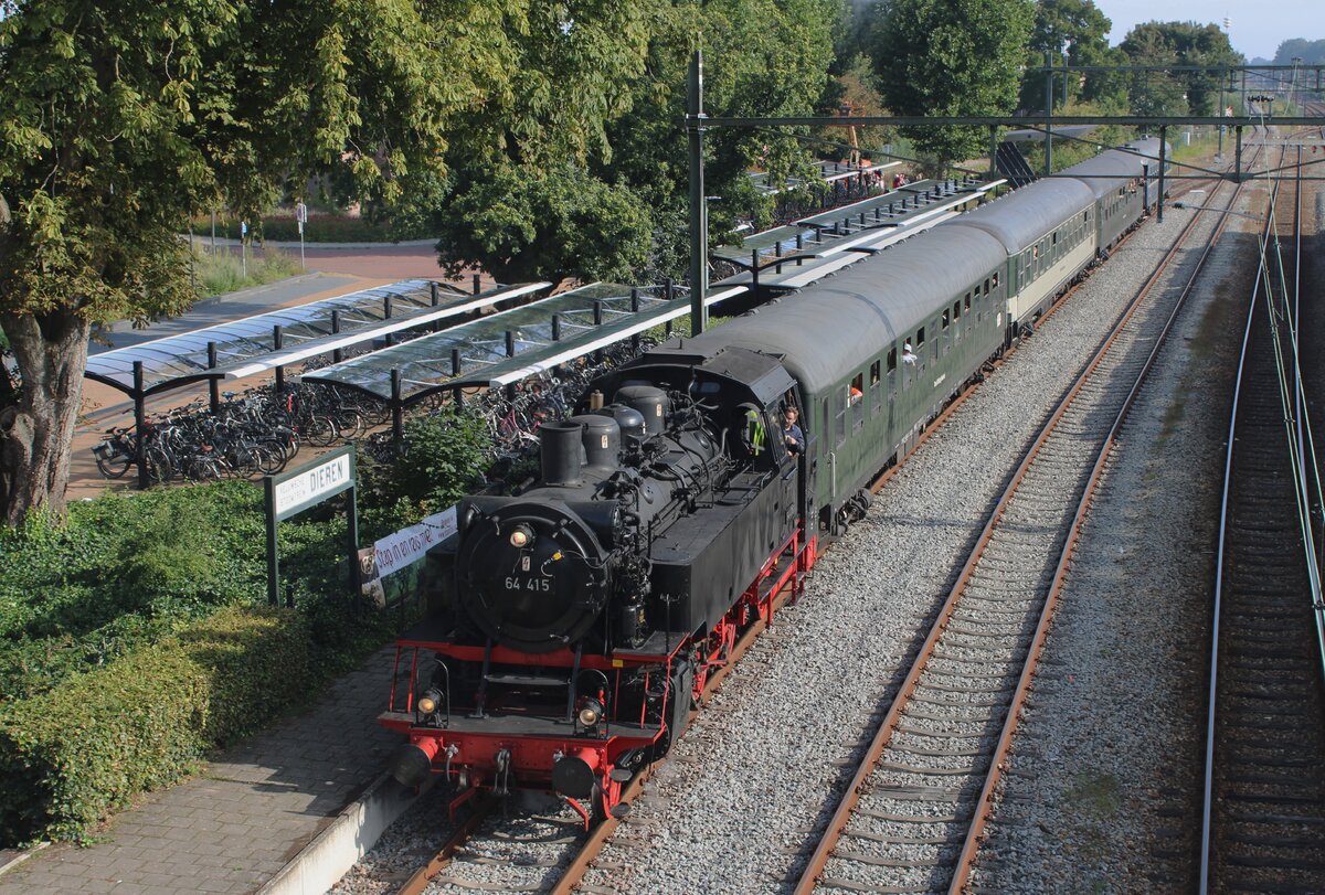 VSM 64 415 calls at Dieren with the 20+ late first steam shuttle train for the steam bonanza Terug naar Toen on 3 September 2023. A much more massive engine was planned for this haul, but she decided to have no urge to do something and the Bubikopf 64 415 had to deputise at last moment's  notice.