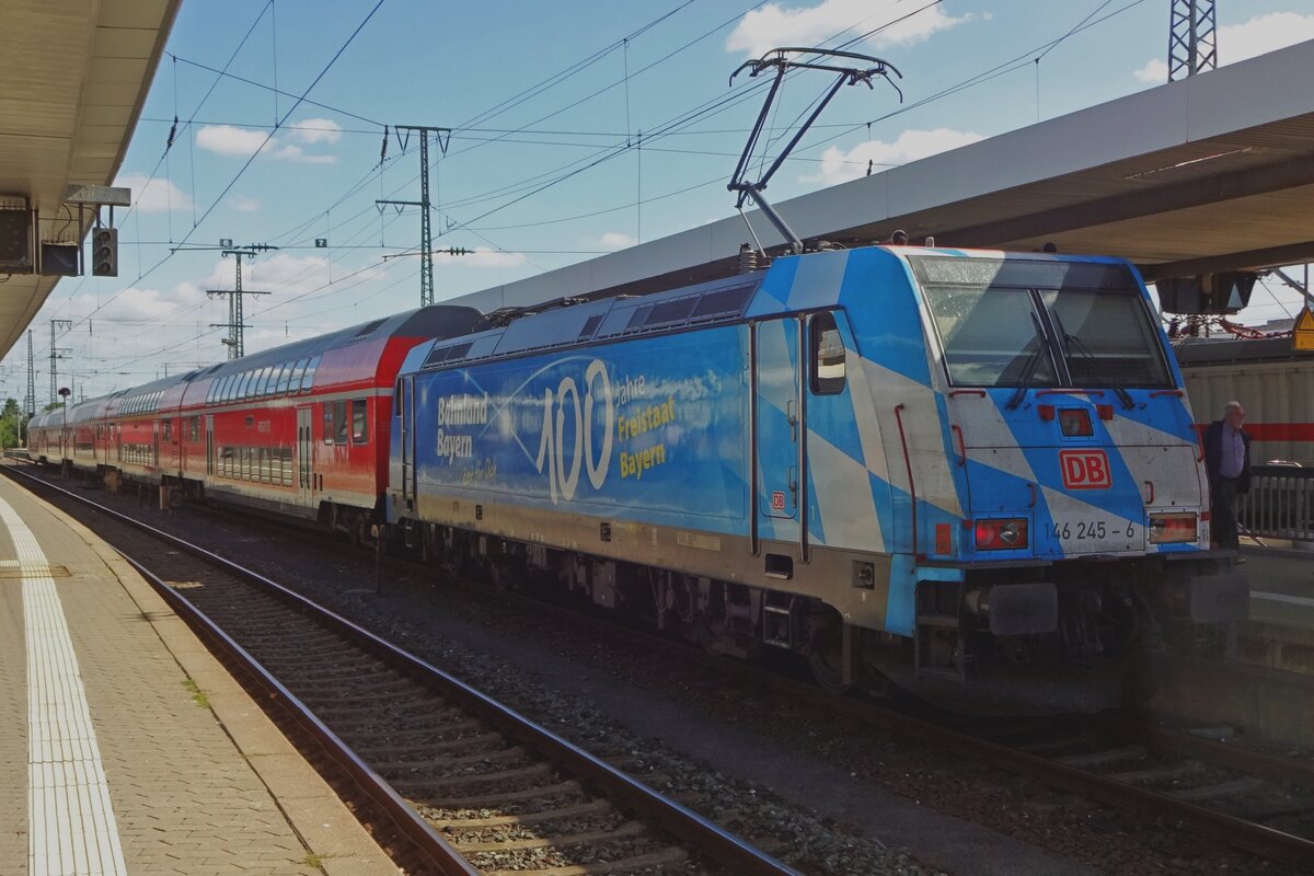 Waving the Bavarian flag as advertising livery, DB Regio 146 245 stands in Nürnberg JHbf on 16 September 2019. 
