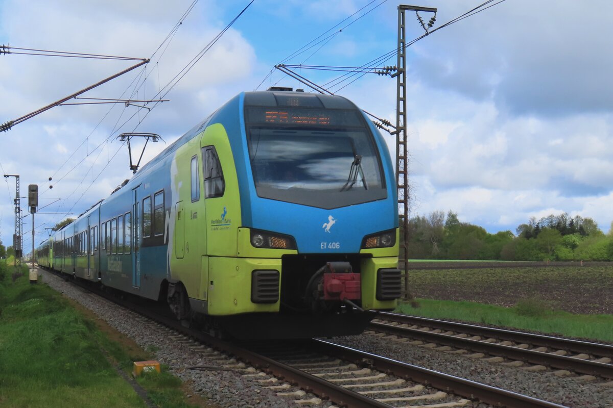 Westfalenbahn ET4-06 passes through Salzbergen on 20 April 2024.