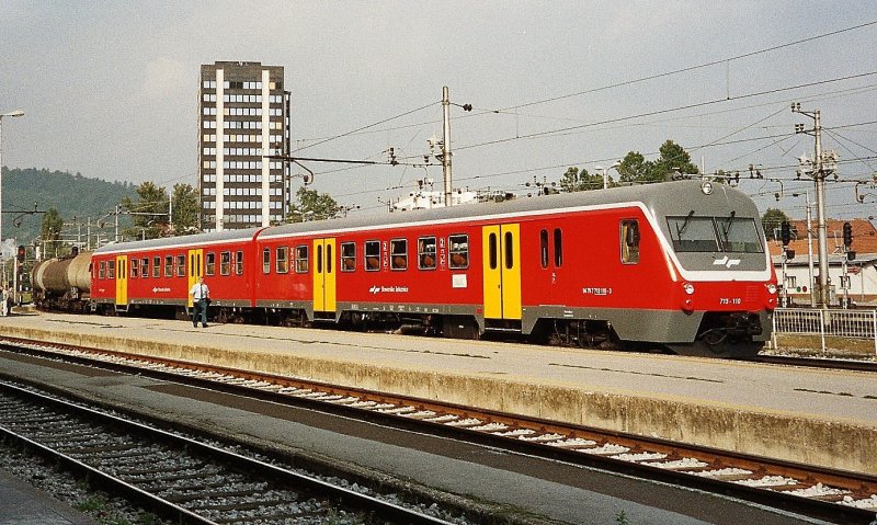 A Class 713 in the new SZ colours in Ljubljana in the September 2004.