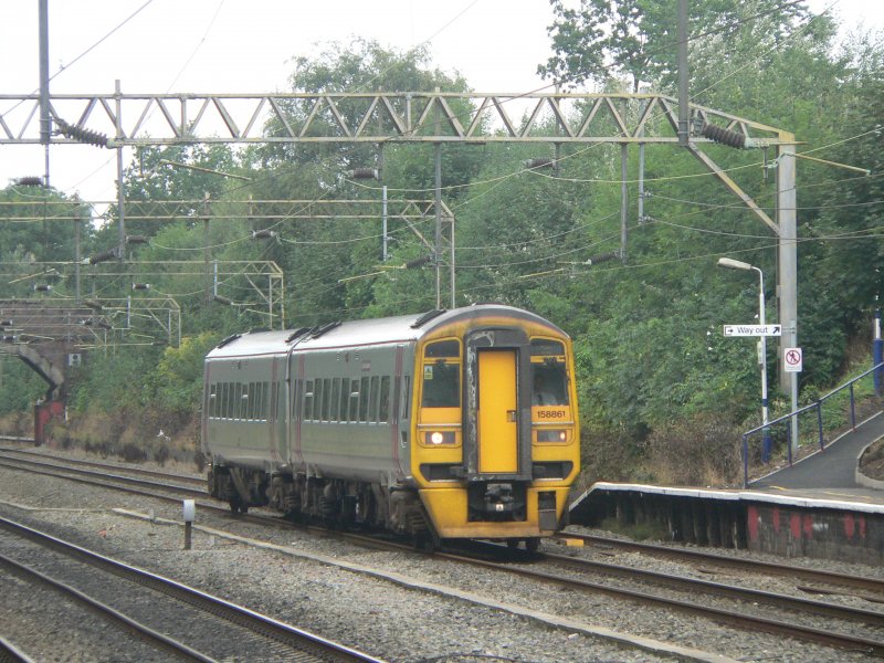 Arriva train 158861 is passing Heaton Chapel in Manchester, August