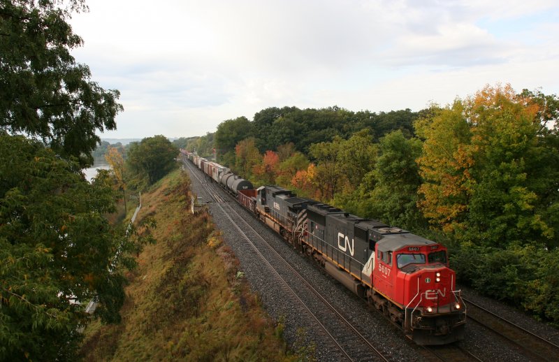 Freight train with CN SD70I 5607 and BC-Rail(CN) Dash-9 C44-9W 4646 on 03.10.2009 at Bayview Junction near Hamilton. 

