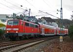 111 111 077-4 with RE 9 (Rhein-Sieg-Express) Aachen - Cologne - Siegen, on 10.12.2011, leaving here the station  Betzdorf/Sieg and continue towards Siegen.