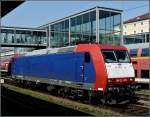 185-CL 003 is running through the station of Regensburg on ...