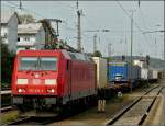 185 185 359-7 is hauling a goods train through the main station of Passau on September 17th, 2010.