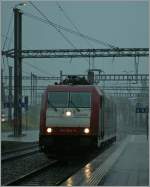 185 The Re 185 594-9 by a heavy shower in Spiez.
 29.06.2011
