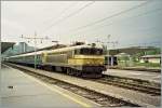 363 The SZ 363 004 with the international overnight train from Zurich to Zagreb - (Beograd) by the stop in Ljubljana. 
(autumn 1996/ scanned negative)