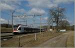 523 A Flirt is arriving on the Vufflens la Ville Station. 
20.02.2012
