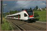 524-ac-dc-flirt A SBB Flirt 524 010-6 by the stop in Russin. 
21.06.2010