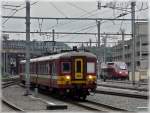 AM 62-79 Two red trains are entering at the same time into the station Li�ge Guillemins on June 28th, 2008.