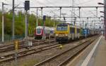 . SNCB Srie 13 double header is hauling a goods train through the station of Rodange on April 29th, 2015.