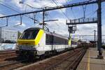 NMBS 1321 hauls a steel train through Antwerpen-Berchem on 14 July 2022.