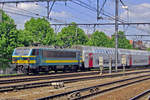 On 10 June 2015 NMBS 2135 pushes M5-stock out of Antwerpen-Berchem toward Antwerpen Centraal and Essen (BE).