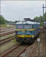 HLE 2601 is heading lots of Srie 26 engines in Cuesmes on June 23rd, 2012.