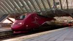 . The PBKA Thalys 4345 is leaving the station Lige Guillemins while the sun is rising on October 18th, 2014.