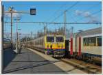 . The IC 812 to Kortrijk is leaving the station of Brugge on November 23rd, 2013.