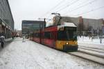 Berlin Streetcar M5 (GT6N 1035 Nuon-Strom) towards Hackscher Markt on 10.1.2010 at Alexanderplatz.