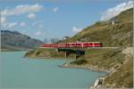 bernina-line An 'Allegra' with a local train by the Lago Bianco on the way to Tirano. 
10.09.2011
