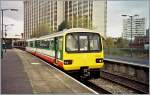 Class 143 143 606 to Barry Island is leaving Cardiff Queen Street Station. 
November 2000  
(Analog Picture from CD)