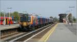 Class 450 455 006 to London Waterloo in Wimbledon. 
19.04.2010
