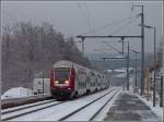 Control cars The IR to Troisvierges is arriving at the station of Wilwerwiltz on December 21st, 2009.
