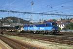 CDC 383 008 hauls an empty rack of container wagons through Bratislava hl.st.