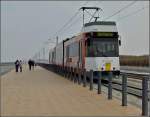 De Kusttram Kusttram N� 6009 is running between Raversijde Bad and Middelkerke on March 27th, 2011. 