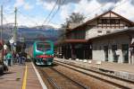 Regional train enters the station of Bressanone / Brixen with ...