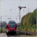 Form signals A DB Flirt is entering into the station of Sassnitz on September 26th, 2011.