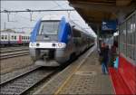 . The SNCF TER Nord - Pas de Calais  Bibi  B 82735 is waiting for passengers in Tournai (B) on May 11th, 2013.