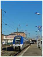 . The SCNF TER Alsace Bibi B 82781 is leaving the main station of Mulhouse on December 10th, 2013.