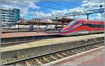 Three high-speed trains from three companies in Lyon Part Dieu: in the foreground the FS Trenitalia ETR 400 031 as FR 664 to Paris Gare de Lyon, in the middle an SNCF inOui TGV Duplex and far in the