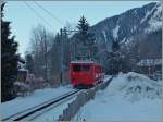 The Beh 4/4 N° 45 with his Bt is going from The Chamonix M-C Station to the  Mer des Glaces . 
10.02.2015