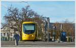 . The Sola Citadis 302 tram N 2002 is arriving at the stop Gare Centrale in Mulhouse on December 10th, 2013.