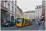 . The Sola Citadis 302 N 2024 is running through the Rue de la Somme in Mulhouse on December 10th, 2013.
