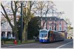 . The Siemens Avanto tram-train N 19 is running through the Avenue du Marchal Foch in Mulhouse on December 10th, 2013.