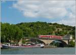 A local train from Trier to Luxembourg City is running over the Sre bridge in Wasserbillig on August 10th, 2012.