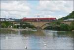 . A local train to Trier is running over the Sre bridge in Wasserbillig on June 14th, 2013.