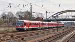 . 628 triple unit is leaving the station of Dillingen/Saar on April 3rd, 2015.